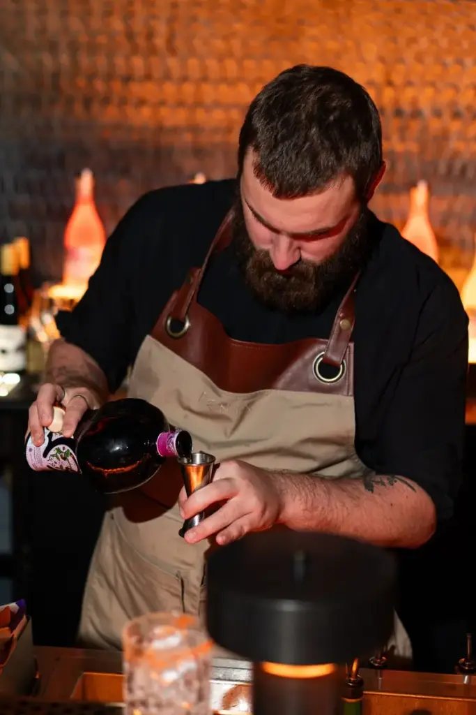 A bartender pouring Shooters Tequila into a jigger at the WSTA GetTogether in Manchester